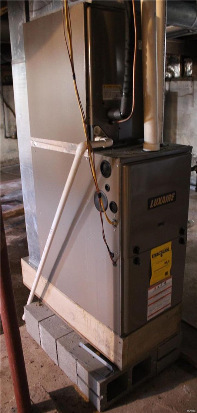 Utility room with heating unit | Image 11