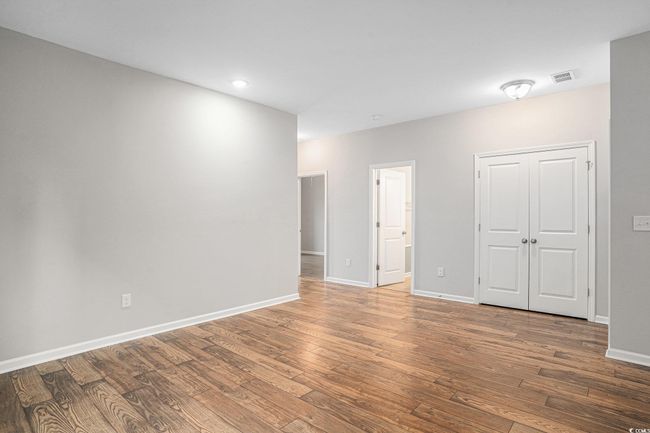 Unfurnished room featuring wood finished floors and recessed lighting | Image 20