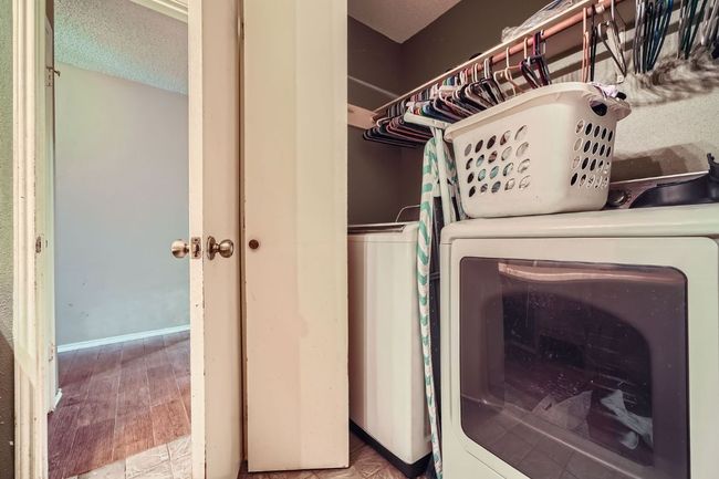 Laundry area with independent washer and dryer | Image 22