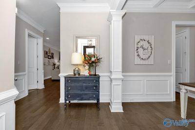 Hardwood flooring throughout the main living areas, 10' smooth ceilings, extensive trim package. | Image 3