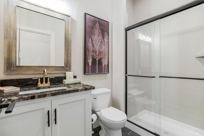 3/4 Bathroom off the entry. Photos of previous model home. Not actual listing. Features and sizes may vary. Contact agent for details & showings! | Image 4