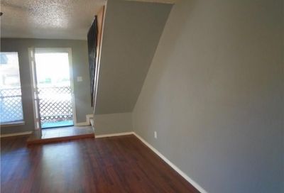 Entryway with a textured ceiling and dark wood-type flooring | Image 3