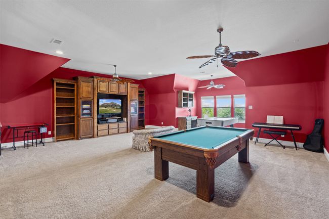 Game room featuring visible vents, carpet floors, pool table, and lofted ceiling | Image 32
