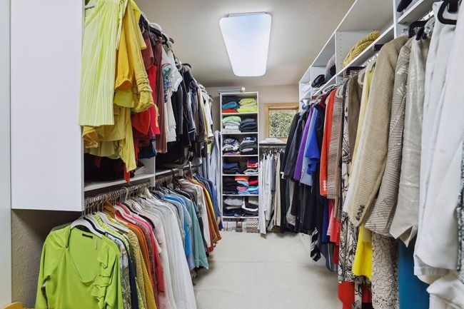 Hello DREAMY closet! Great storage and built-ins. Fabulous windows make this space light and bright!! | Image 27