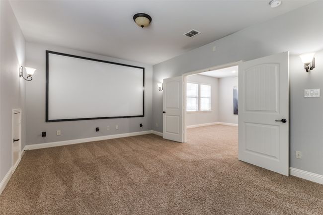 Media room with Wall screen, prewired for 7.1 surround sound, wires for projector. | Image 22