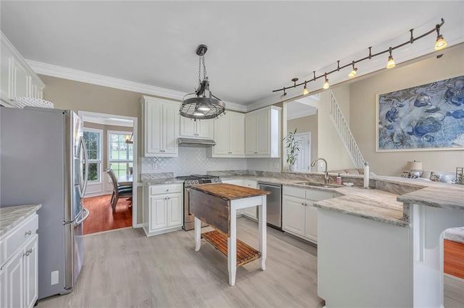 225 Ruby Forest Pkwy, House other with 4 bedrooms, 3 bathrooms and 5 parking in Suwanee GA | Image 11
