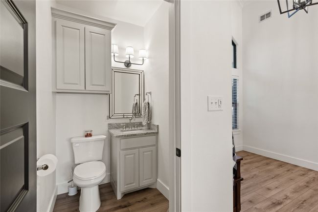 Half bath with wood finished floors and vanity | Image 31
