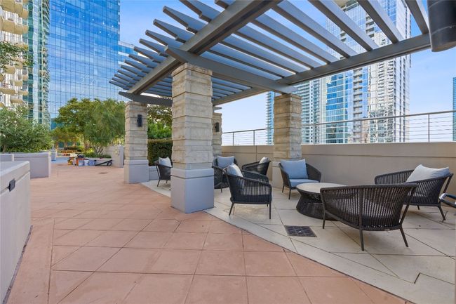 View of patio featuring a pergola and an outdoor living space | Image 25