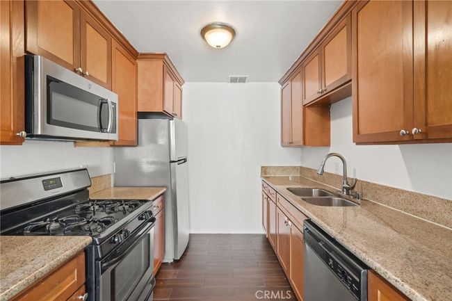 Beautifully remodeled kitchen with lots of cabinets & countertop space | Image 6