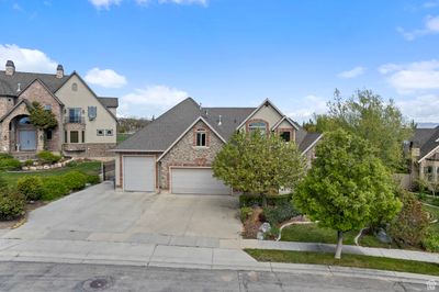 View of front of home featuring a garage | Image 2