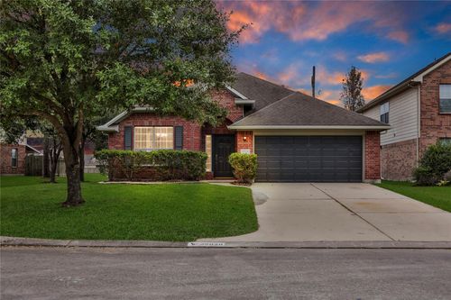 22028 Knights Cove Dr, Kingwood, TX, 77339-7704 | Card Image