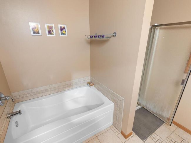 Soaking tub and separate shower in primary bath | Image 31