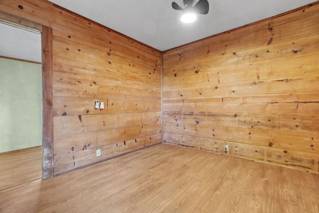Empty room with wood finished floors | Image 22