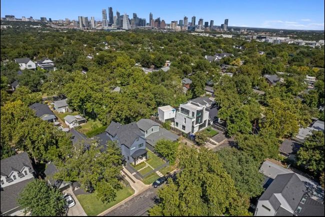 Aerial overview of property's location with city skyline | Image 26
