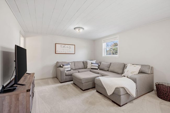 You'll love this additional family room in the lower level! | Image 24