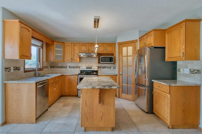 206 Valley Glen Bay Nw, Home with 4 bedrooms, 3 bathrooms and 4 parking in Calgary AB | Image 9