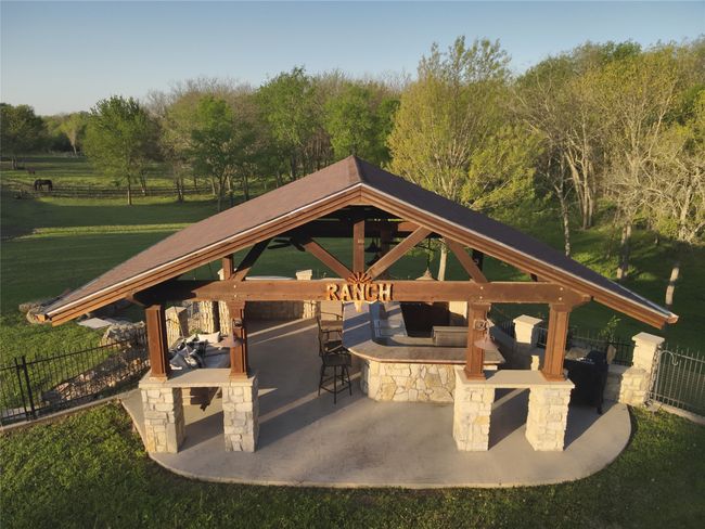 View of property's community with a gazebo, a patio area, outdoor dry bar, and fence | Image 27