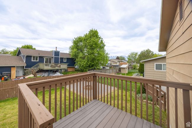 Wooden deck featuring a residential view | Image 30