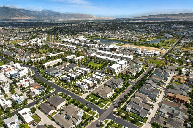 Aerial view of property's location featuring a water and mountain view and nearby suburban area | Image 55