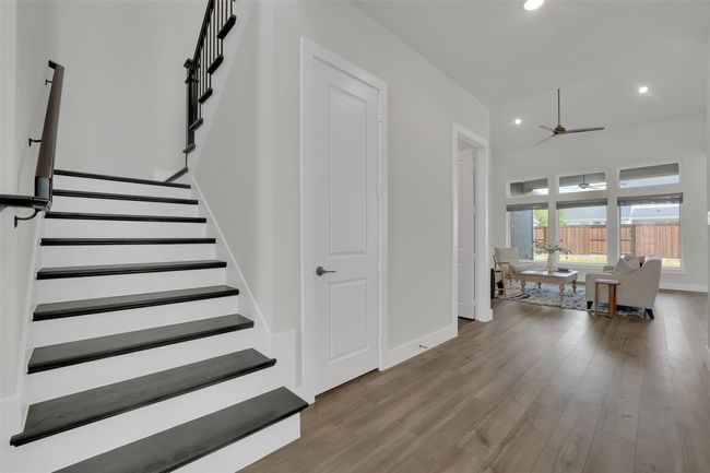 Stairway with recessed lighting, wood finished floors, baseboards, and ceiling fan | Image 31