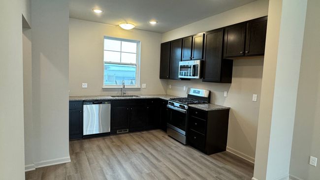 29977 Center St, Condo with 2 bedrooms, 3 bathrooms and null parking in New Hudson MI | Image 7