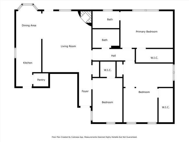 This floor plan features a spacious layout with three bedrooms, two bathrooms, and a large living area connecting to a dining space and kitchen. The primary bedroom includes a walk-in closet, and there is a pantry off the kitchen. Ideal for comfortable family living. | Image 4
