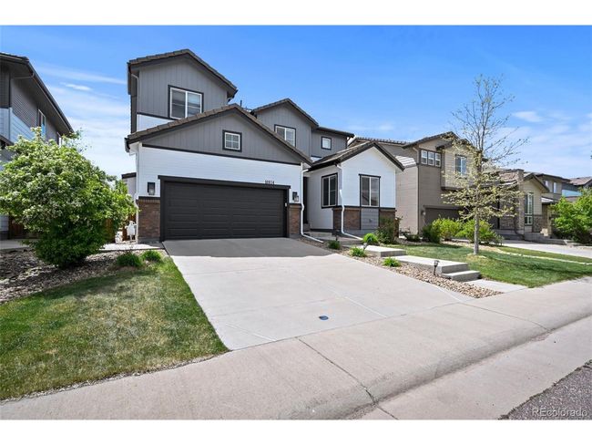 10934 Touchstone Loop, House other with 4 bedrooms, 4 bathrooms and null parking in Parker CO | Image 48