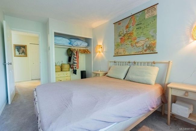 Bedroom featuring carpet floors and a closet | Image 6