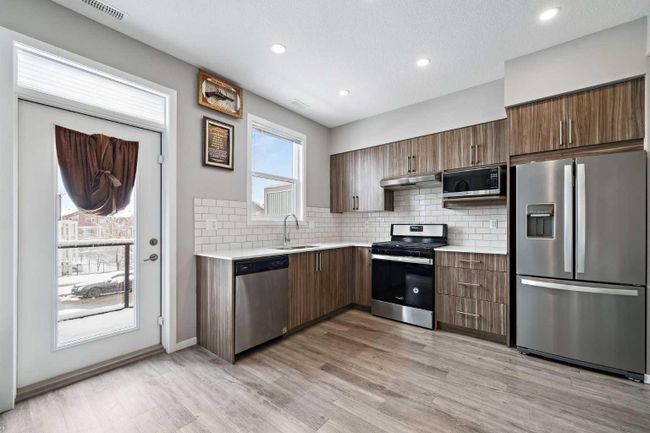 202 - 215 Redstone Ne, Home with 2 bedrooms, 2 bathrooms and 1 parking in Calgary AB | Image 6