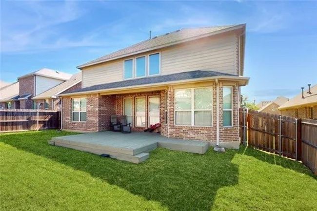 Back of property featuring a fenced backyard and brick siding | Image 14