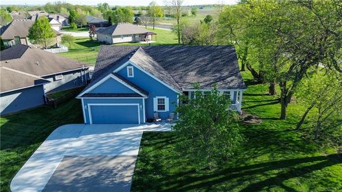 2010 Prairie Grass Dr, Raymore, MO, 64083-8358 | Card Image