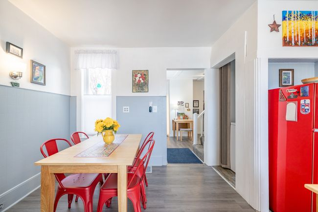 Dining space with wood finished floors | Image 22