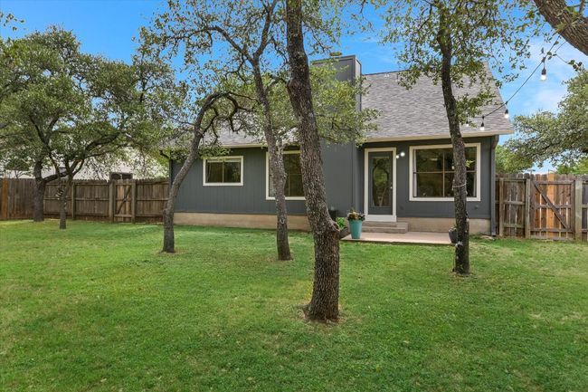Enjoy unwinding with family amidst the tranquility of your own backyard. | Image 19