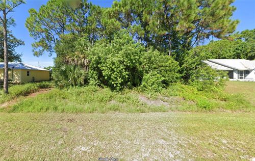 1072 Lamplighter Dr Nw, PALM BAY, FL, 32907-7974 | Card Image