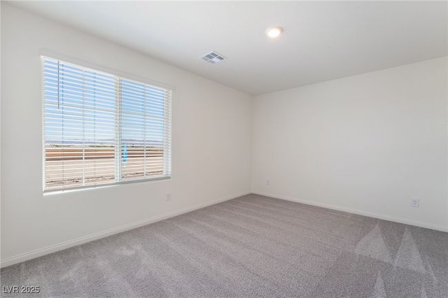 Carpeted empty room with baseboards | Image 26