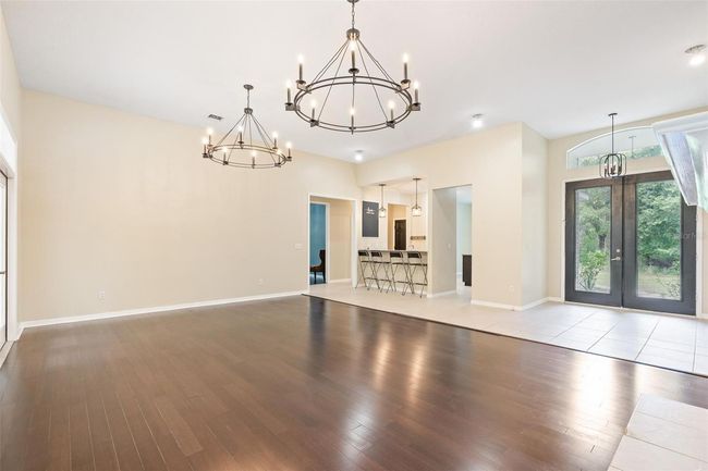 11933 Pasco Trails Blvd, House other with 4 bedrooms, 3 bathrooms and null parking in SPRING HILL FL | Image 6
