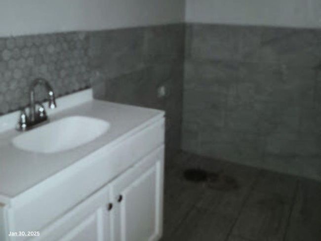 Bathroom featuring vanity | Image 7