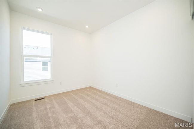 Spare room featuring light colored carpet and recessed lighting | Image 27