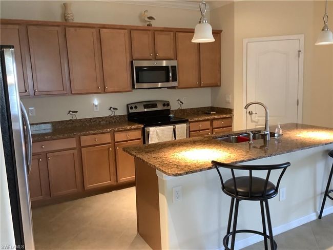 11422 Icarus Cir, House other with 4 bedrooms, 3 bathrooms and 2 parking in LEHIGH ACRES FL | Image 5