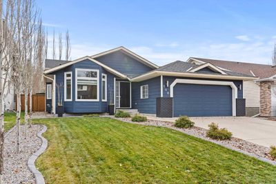 148 Woodbend Way, House other with 4 bedrooms, 3 bathrooms and 4 parking in Okotoks AB | Image 1