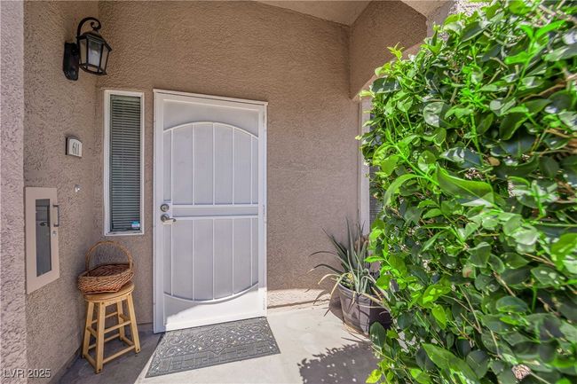 View of exterior entry with stucco siding | Image 4