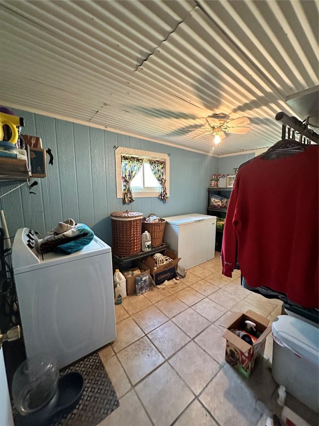 Laundry area featuring separate washer and dryer | Image 17