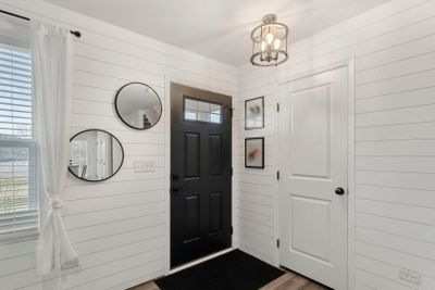 Updated with New light Fixture and shiplap. Adjace | Image 3