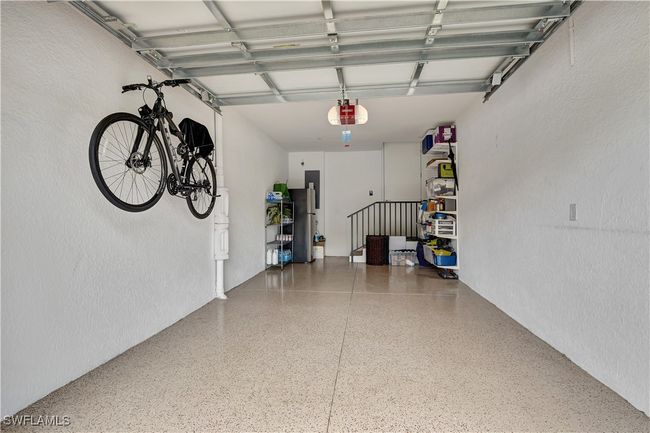 Garage Featuring epoxy flooring | Image 28