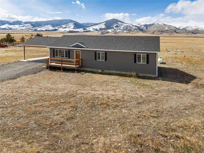 View of front of property with roof with shingles and a deck with mountain view | Image 11