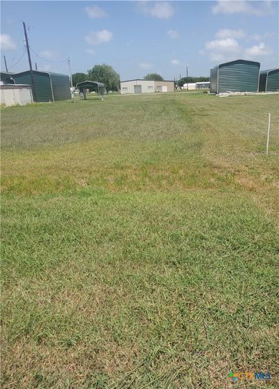 View from street looking to rear of lot. 63' front of lot faces West. | Image 1