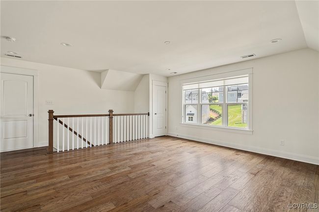 Bonus room with wood finished floors and recessed lighting | Image 23