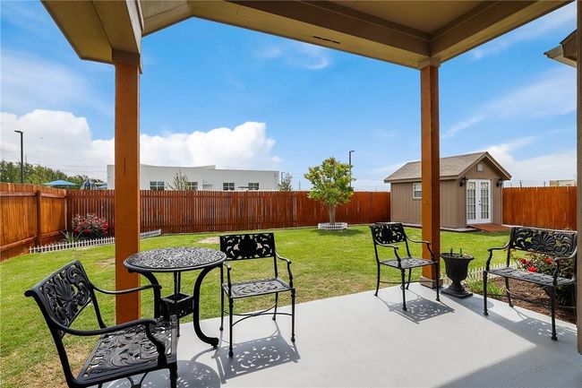 View of patio / terrace featuring an outbuilding | Image 19