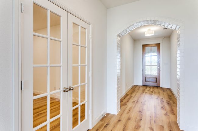 Entryway featuring french doors and light wood-type flooring | Image 5