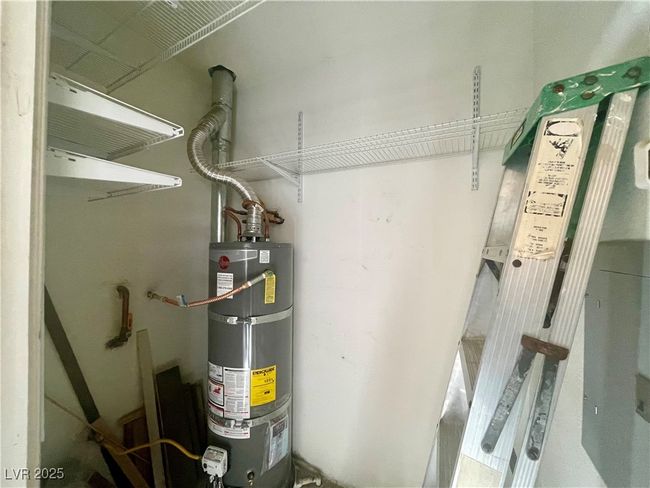 Utility room featuring water heater | Image 22